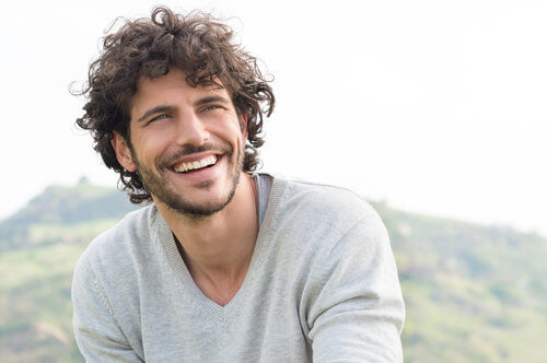 Young man smiling outdoors