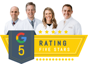 Dental team members at Desert Hills Dental Care with a five-star Google rating badge, showcasing professionalism and commitment to quality dental services.